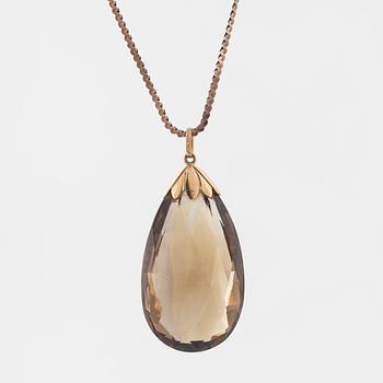 A briolette cut smoky quartz pendant by GVH, Stockholm, 1936.