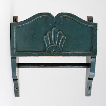 A carved and painted folk art towel rack 19th century.