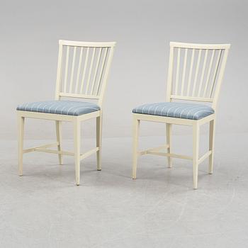 Carl Malmsten, a 'Herrgården' dining table and a set of four 'Vardags' chairs, second half of the 20th Century.