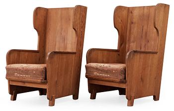 A pair of Axel Einar Hjorth 'Lovö' pine armchairs by Nordiska Kompaniet,