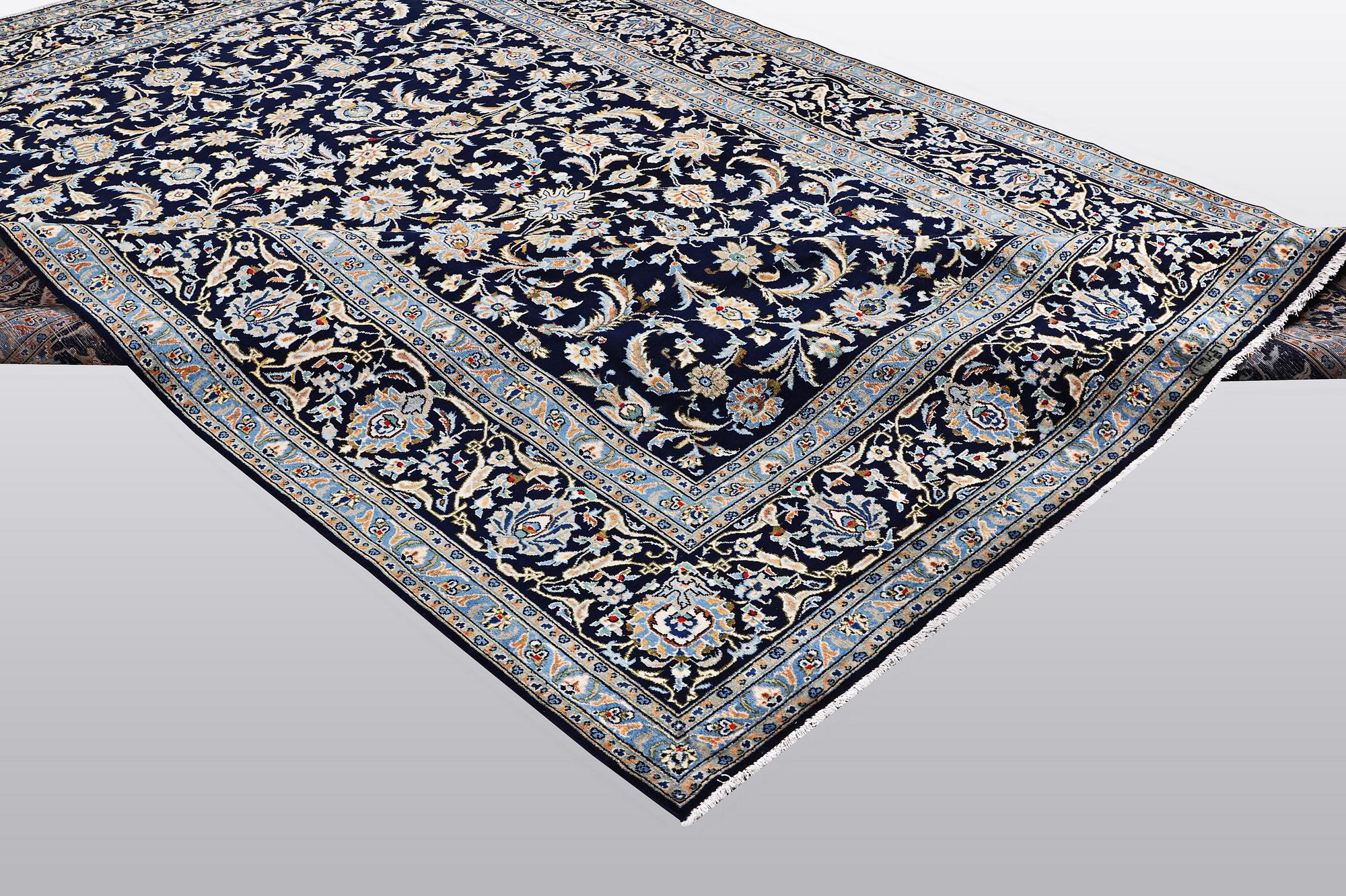 A carpat, Kashan signed Reza Torshi, ca 370 x 250 cm.