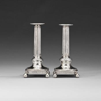 1017. A matched pair of Swedish 18th century silver candlesticks, marks of Johan Wilhelm Zimmerman, Stockholm 1799.