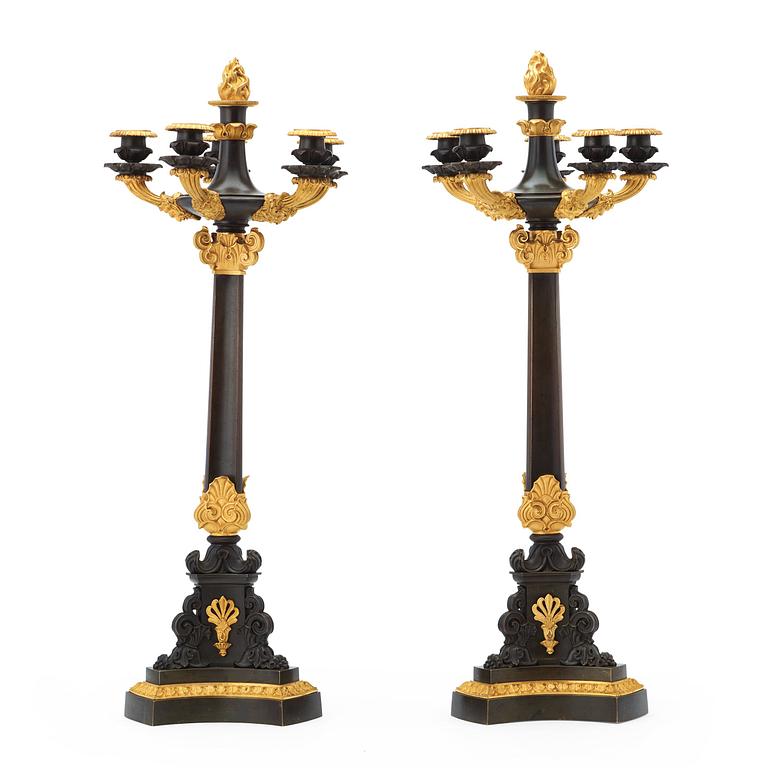 A pair of French 1830/1840's late Empire six-light candelabra.