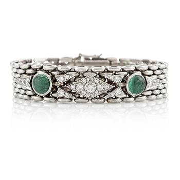 538. An 18K gold bracelet  with cabochon-cut emeralds and round brilliant- and eight-cut diamonds.