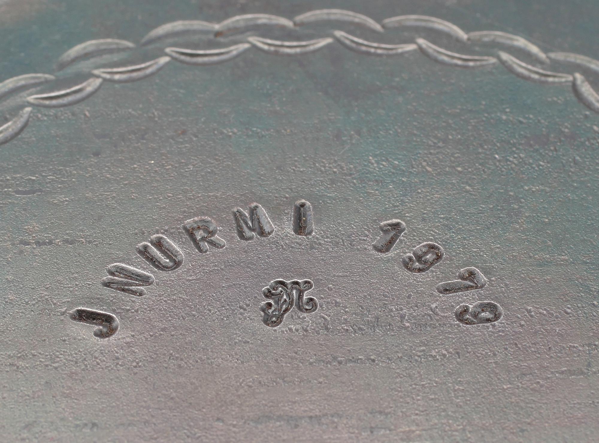 CHAMPAGNEKYLARE OCH LJUSSTAKE, järn, J Nurmi, 1979 och 1980.