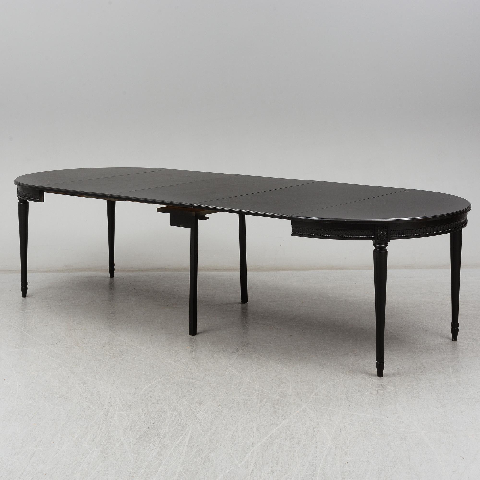A late 20th Century painted table.