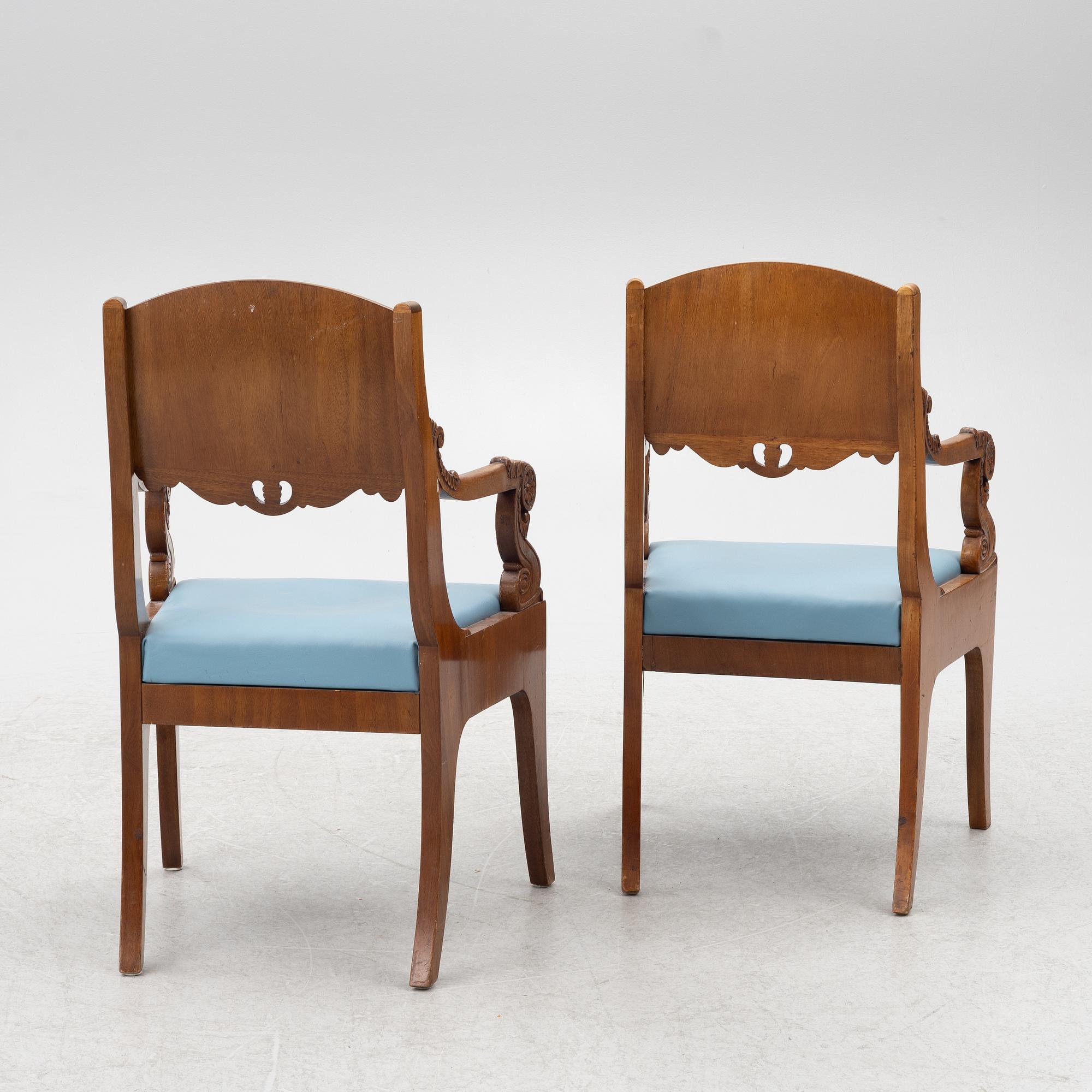 A pair of Baltic late Empire mahogany open armchairs, ca 1840.