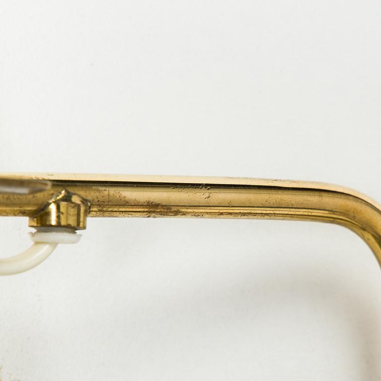 Paavo Tynell, a brass wall light model 9459, Idman, Finland 1960s.