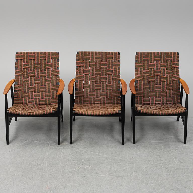 A set of three 1950's easy chairs.