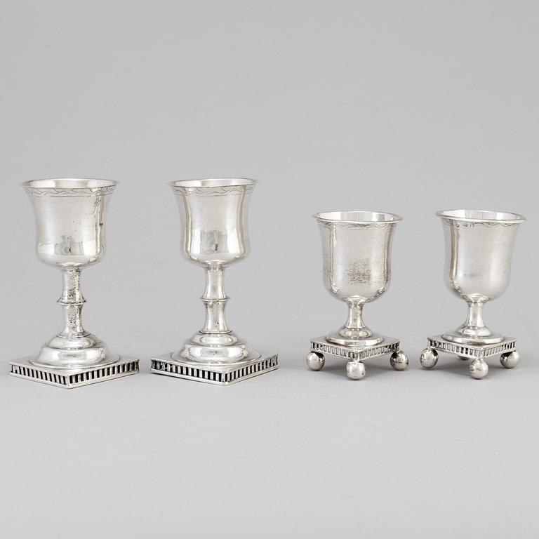 Four 19th century, silver goblets.