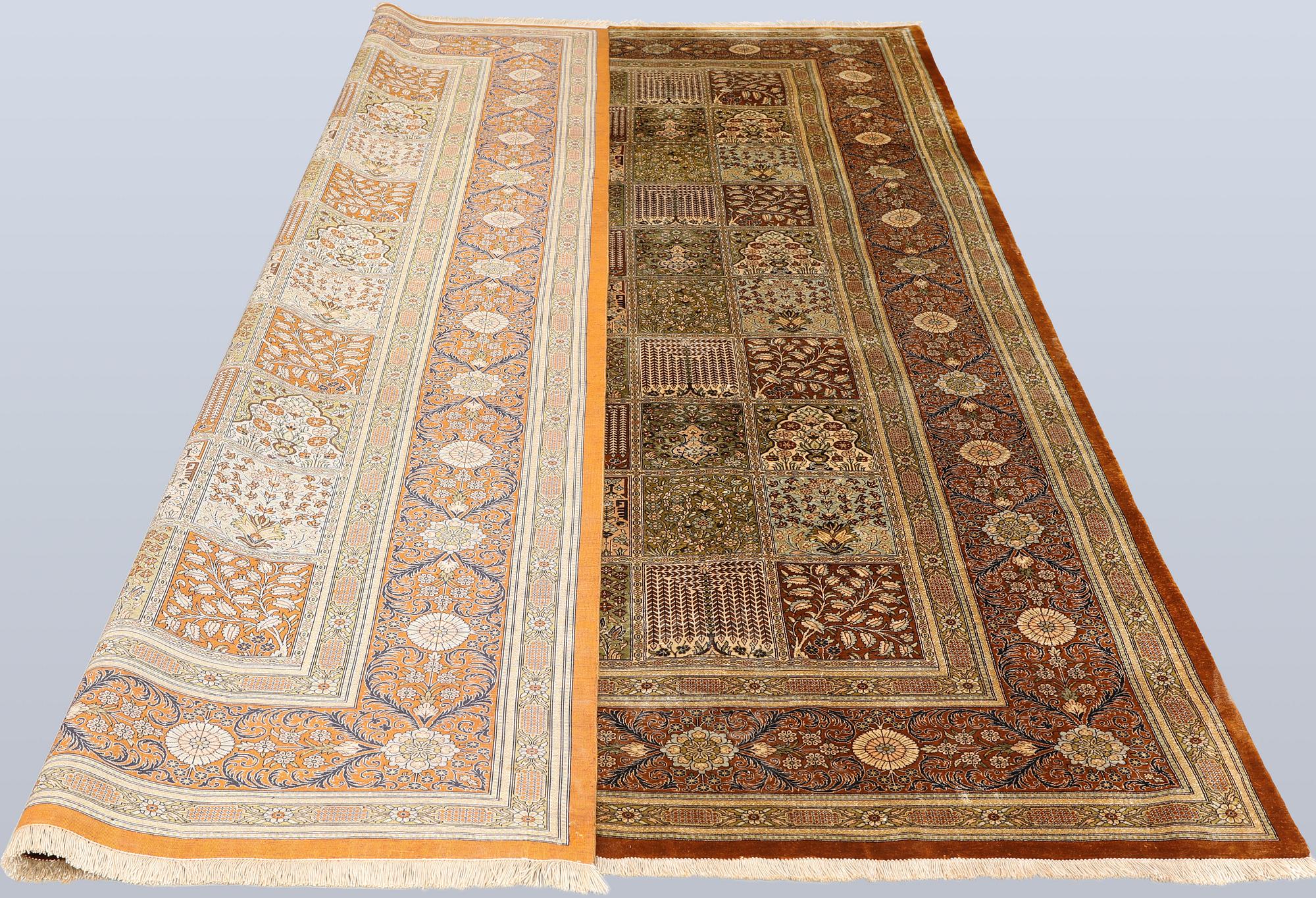 A Gohm silk rug, signed, approx. 307 x 195 cm.