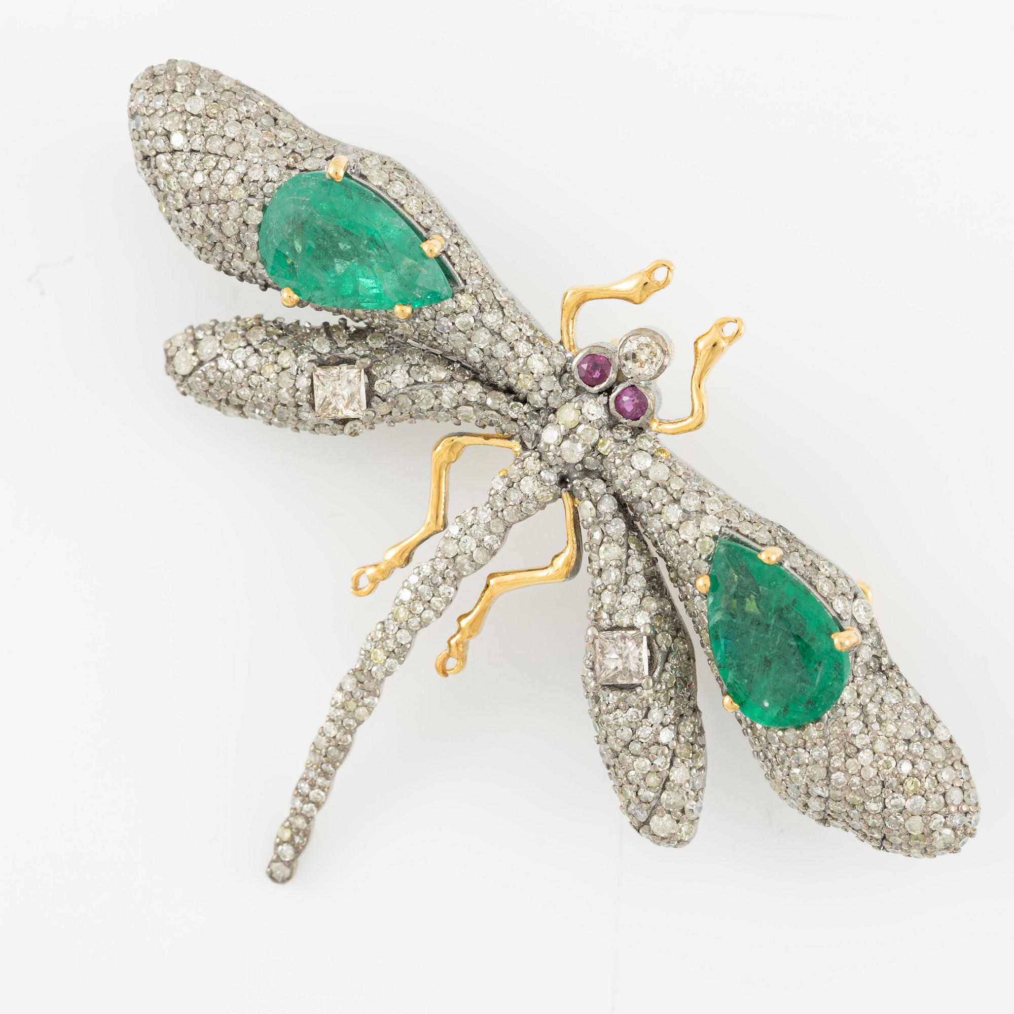 Brooch, in the form of a butterfly, silver and 14K gold set with emeralds, rubies, and princess-cut and octagonal-cut diamonds.