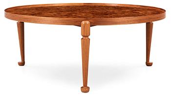 A Josef Frank burrwood and walnut sofa table by Svenskt Tenn, model 2139.
