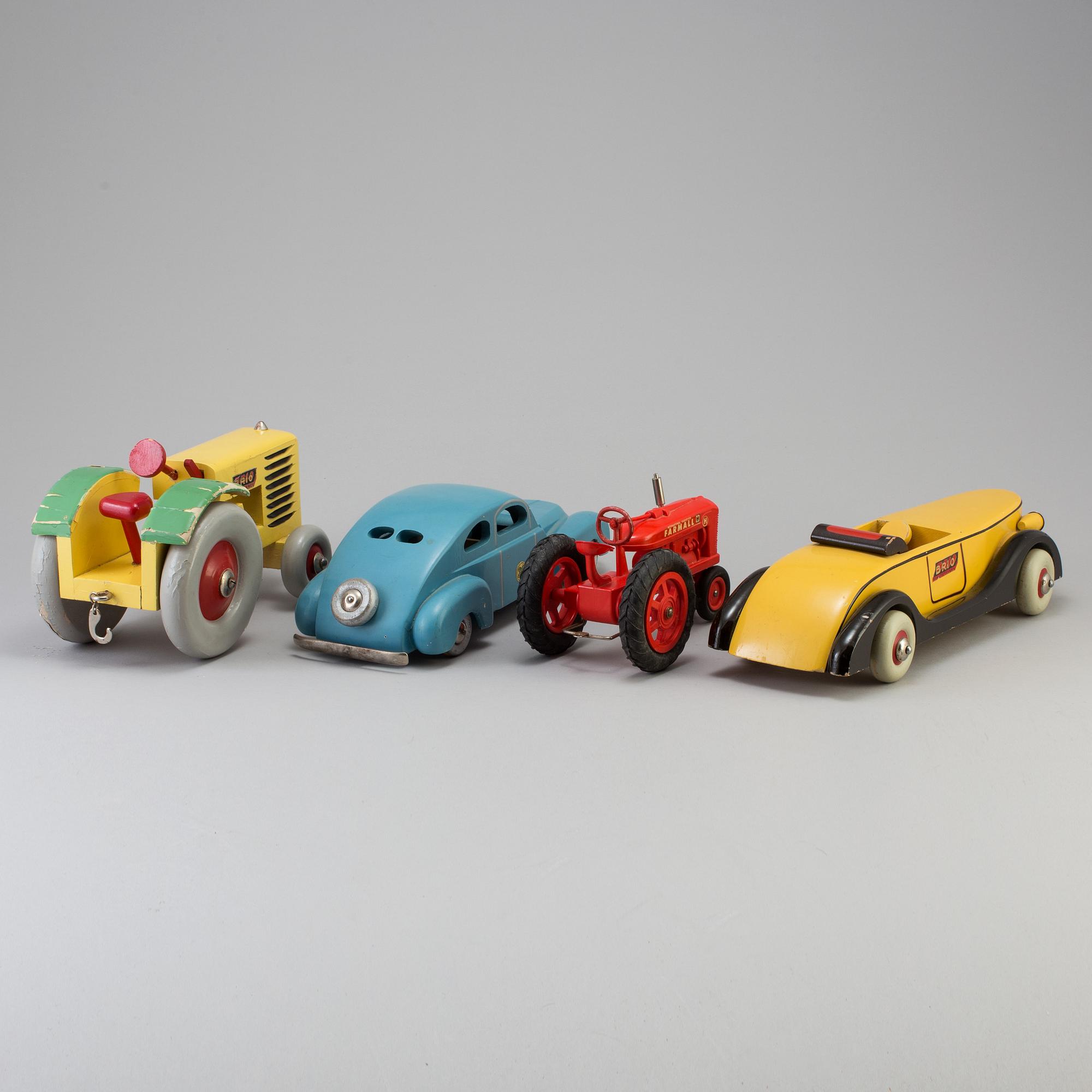 Four wood and plastic toys, Brio and Luck, Sweden, mid 20th century.