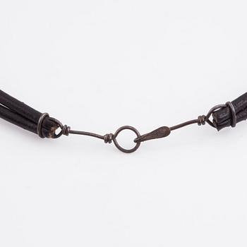 Vivianna Torun Bülow-Hübe, a leather and silver necklace and a pair earrings, studio work Stockholm ca 1950-55.