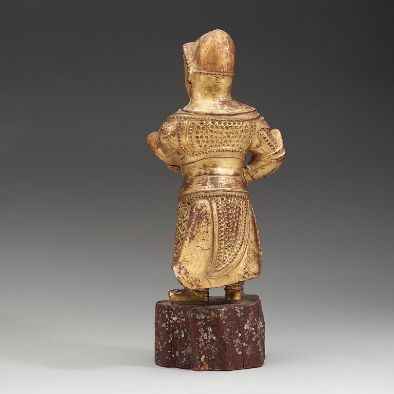 A wood sculpture of a guardian figure, (1644-1912).