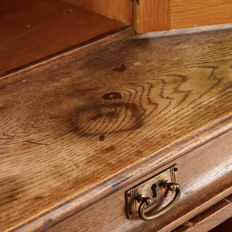 An oak art noveau cabinet, early 20th Century.