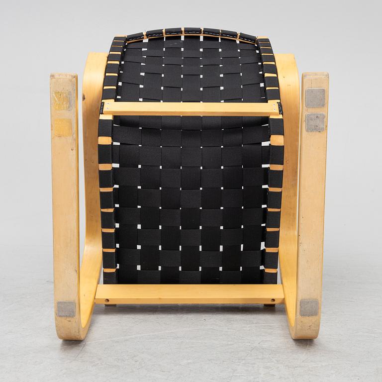 Alvar Aalto, a model '406' armchair, Artek, late 20th Century.