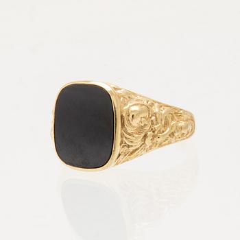 Ring/klackring 9K guld samt svart polerad sten.