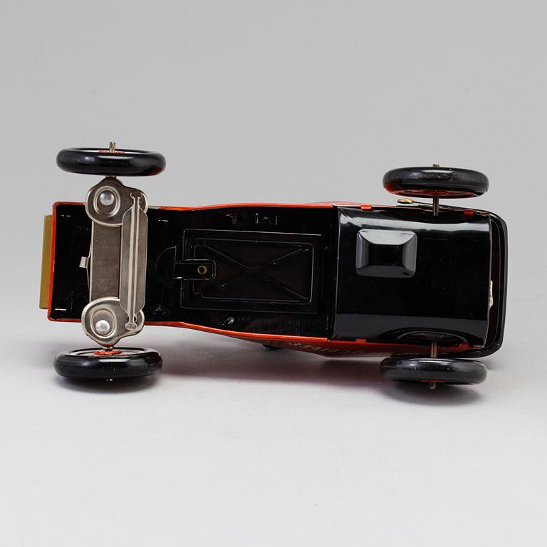 A toy metal car "Sunday Driver", Kosuge, Japan, and "Giant Helicopter", YF, Japan. 1960s.