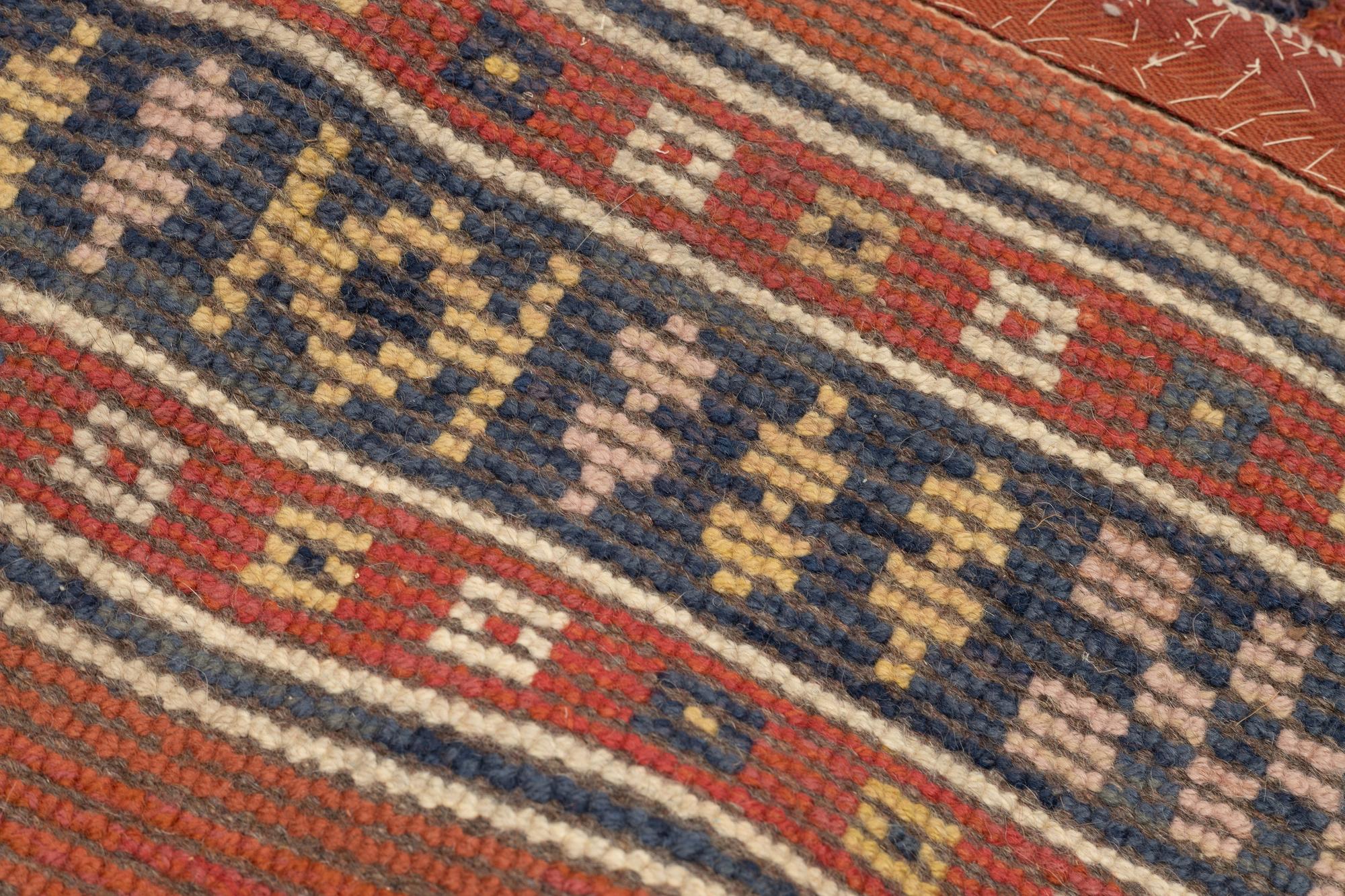 Märta Måås-Fjetterström, a carpet, "Röd Flossa", knotted pile, ca 300 x 272 cm, signed AB MMF.