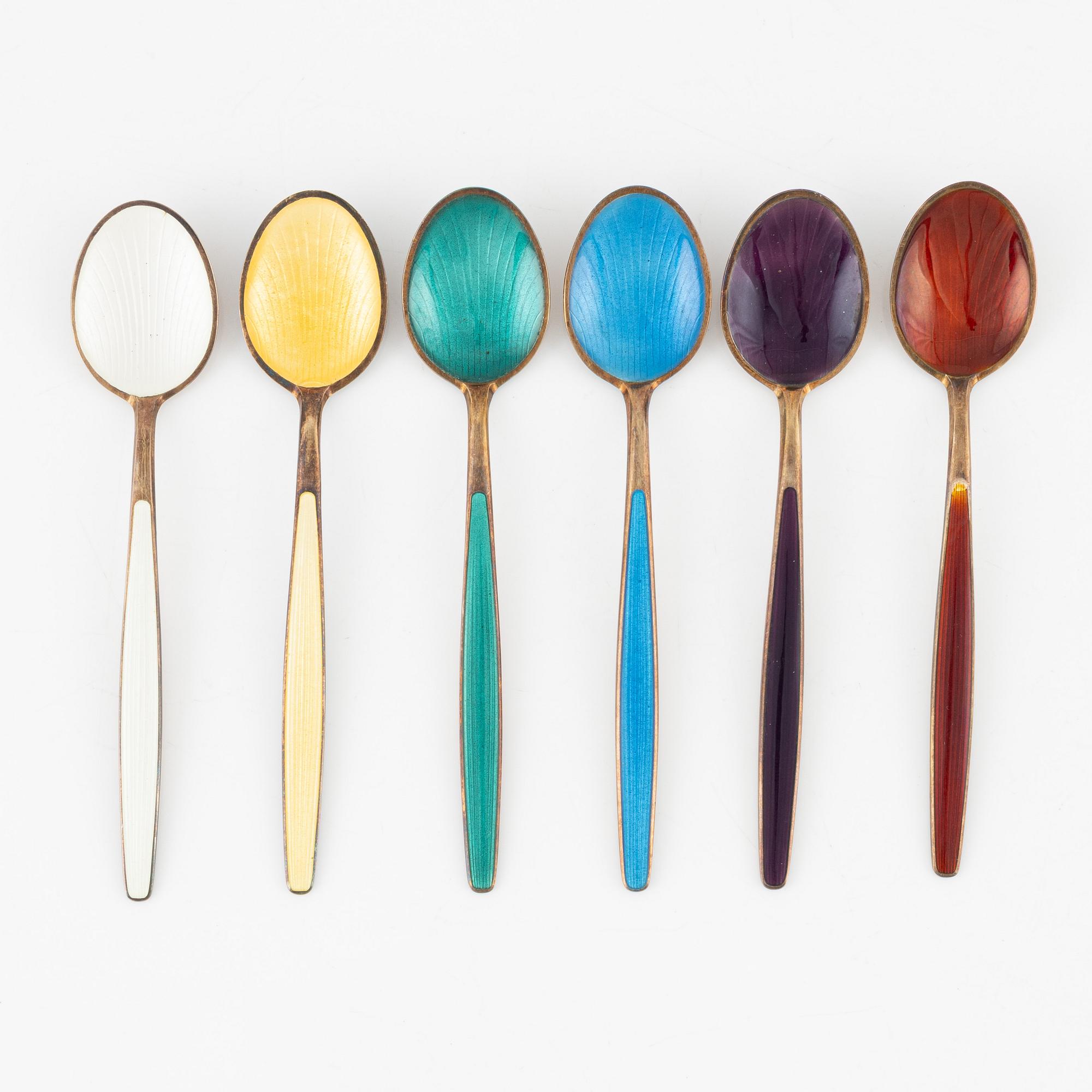 Enamel spoons, 6 pcs, sugar bowl and creamer, and two tongs, silver.