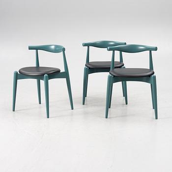Hans J. Wegner, a set of three "CH-20" dining chairs, Carl Hansen & Son, Denmark 21st century.