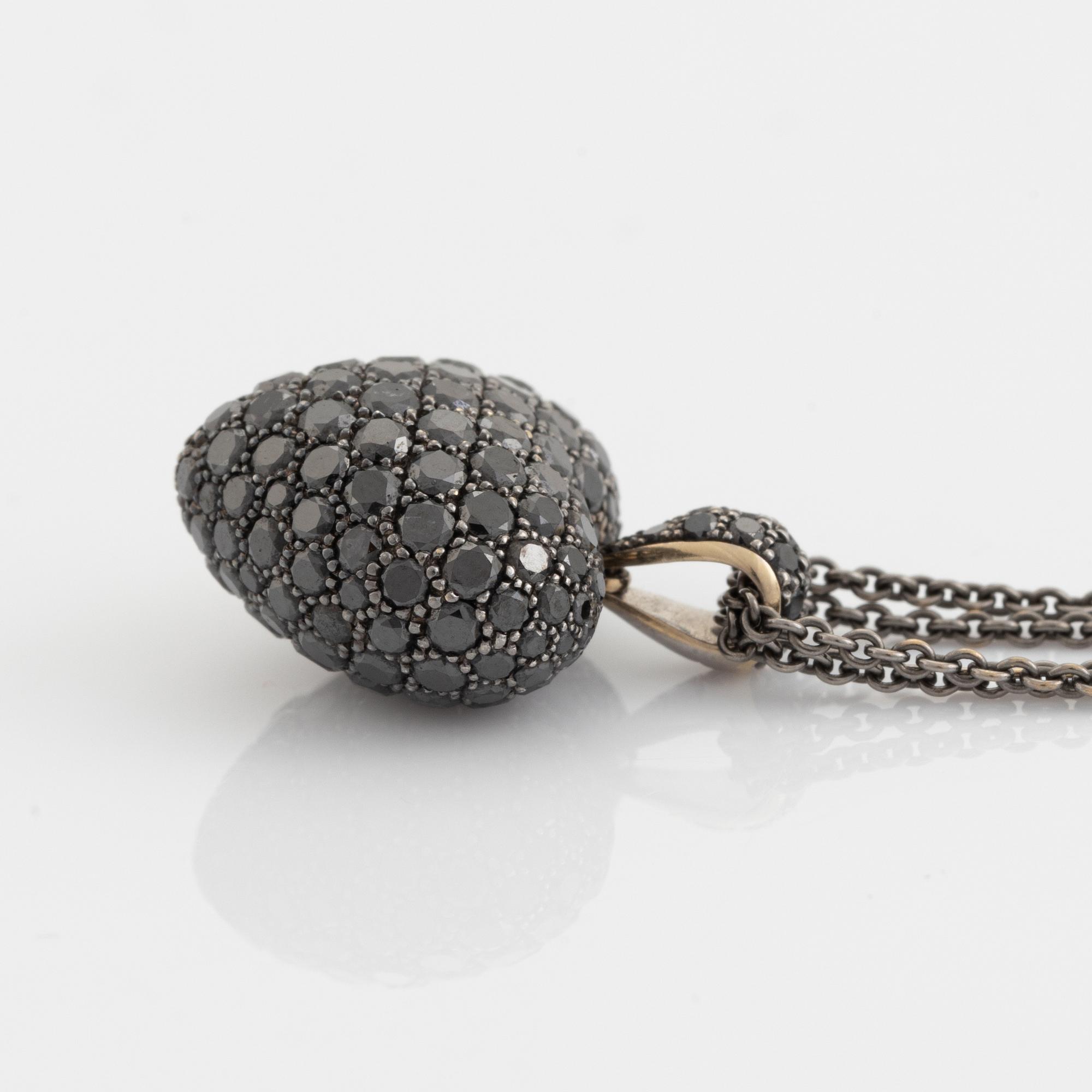 TOWE jewels hjärta 18K vitguld med svarta diamanter.