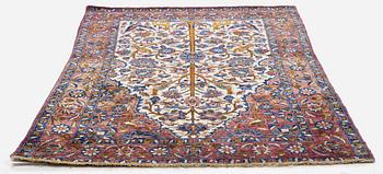 An Antique silk Keshan rug, Central Persia, c. 152 x 105 cm.