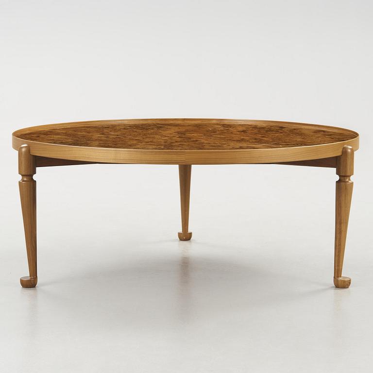 A Josef Frank walnut and burled wood sofa table, model 2139, post 1985.