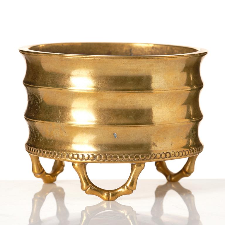 A gilt bronze tripod censer, Qing dynasty, possibly 18th Century.