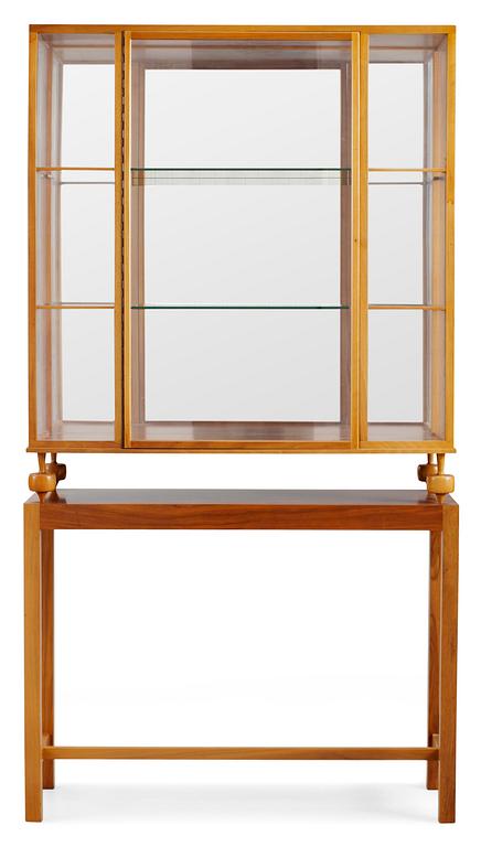 A Josef Frank walnut showcase cabinet, Svenskt Tenn, model 2077, 1960's.
