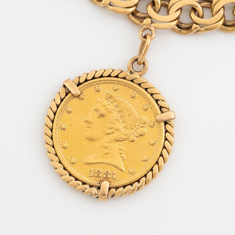 Armband guld bismarcklänk med berlocker med guldmynt.