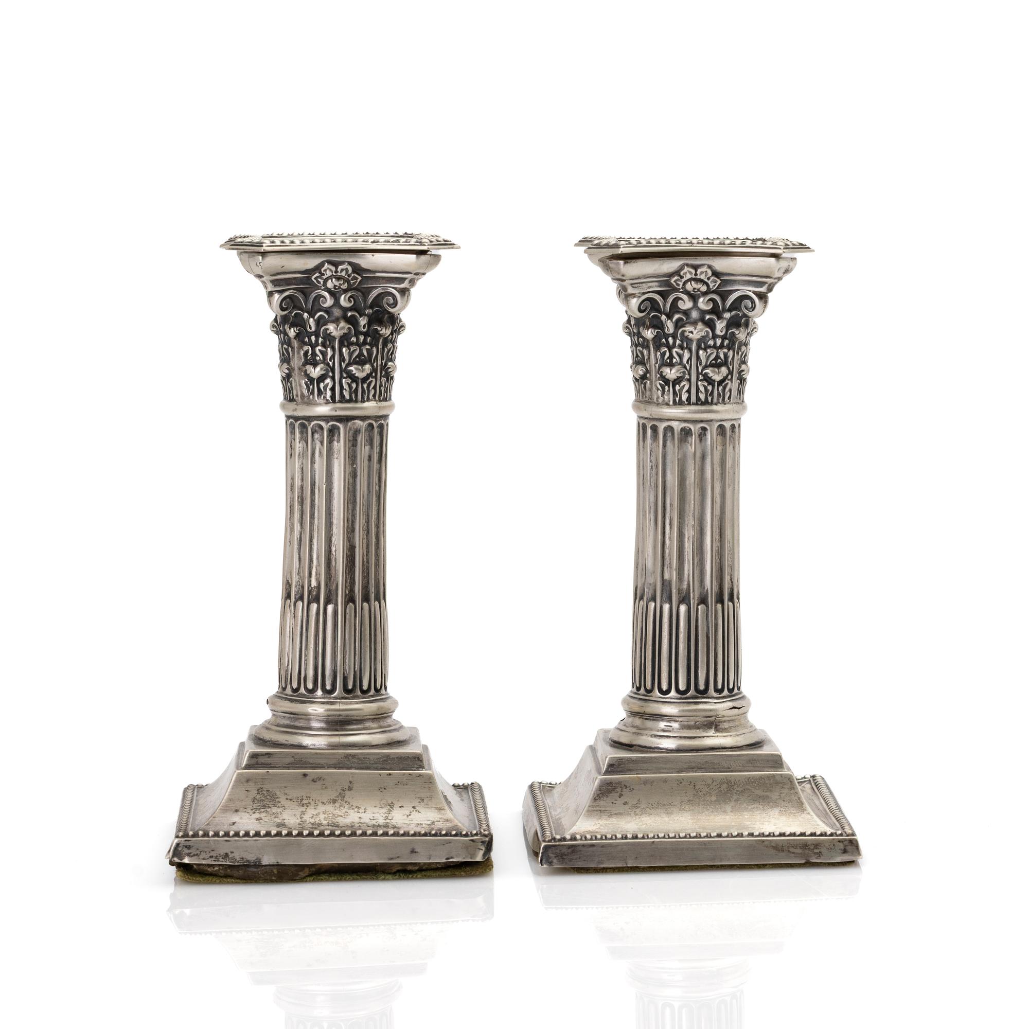 Candlesticks, a pair, silver, Birmingham, England, first half of the 20th century.