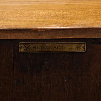 A bookshelf by Axel Einar Hjorth for Nordiska Kompaniets verkstäder (NK), Nyköping, late 1930's.