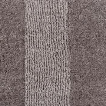 A Layered "Wool Cubes" carpet, 390x620 cm.