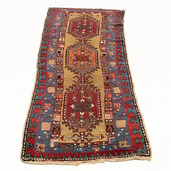 An antique Northwest Persian runner, c. 257 x 99 cm.