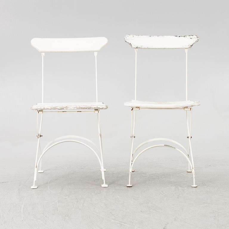 A set of seven garden chairs and two tables Byarums bruk, later part of the 20th century.