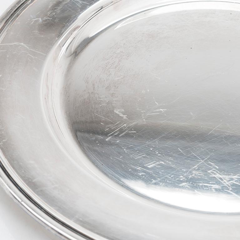 A 12-piece set of silver chargers, makers' marks of Hugo Grün, S.H. Jörgensen..., Denmark, around mid-20th century.