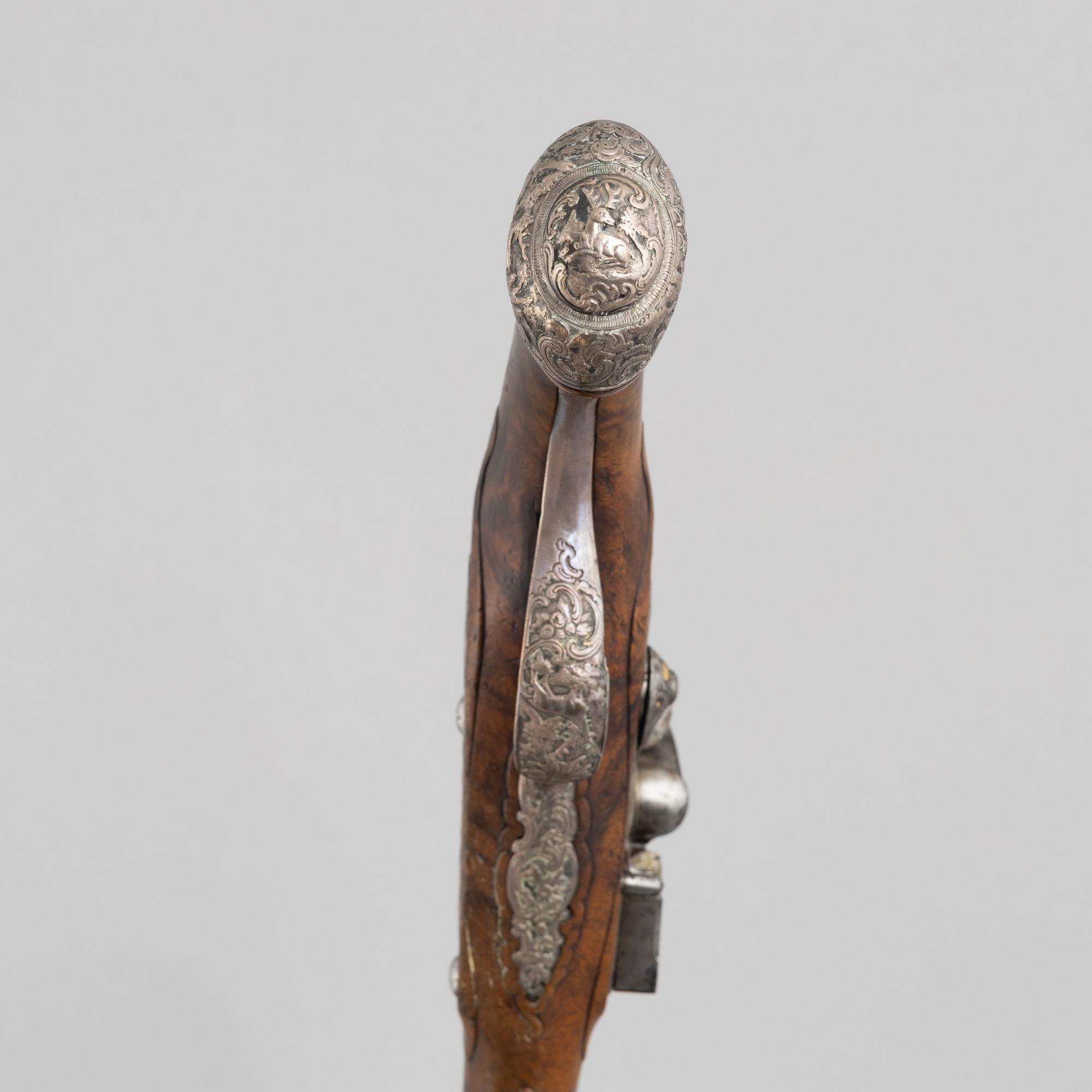 A Pair of flintlock pistols, by Johann Jacob Kuchenreuter, (Regensburg 1709-1783, Royal gunsmith).