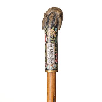 A Chinese bamboo walking cane with a cloisonné handle, late Qing dynasty/early 20th Century.