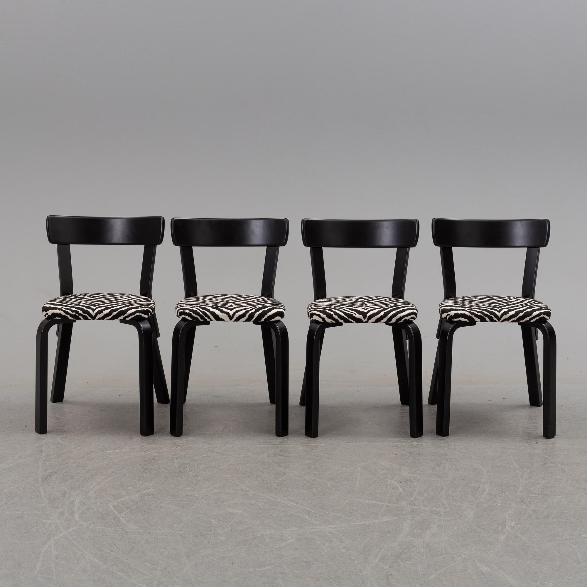 a dining table '81B' and four '69' chairs by Alvar Aalto, Artek.