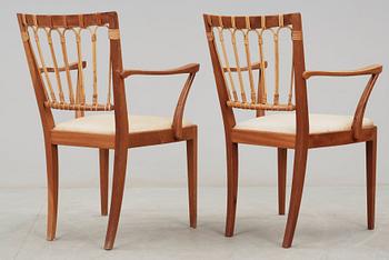 A pair of Josef Frank mahogany chairs, Svenskt Tenn, model 1165.
