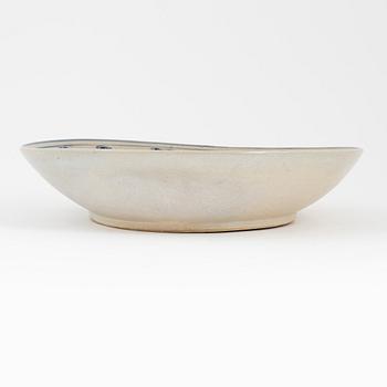 A ceramic dragon dish, Sout East Asia, 20th century.
