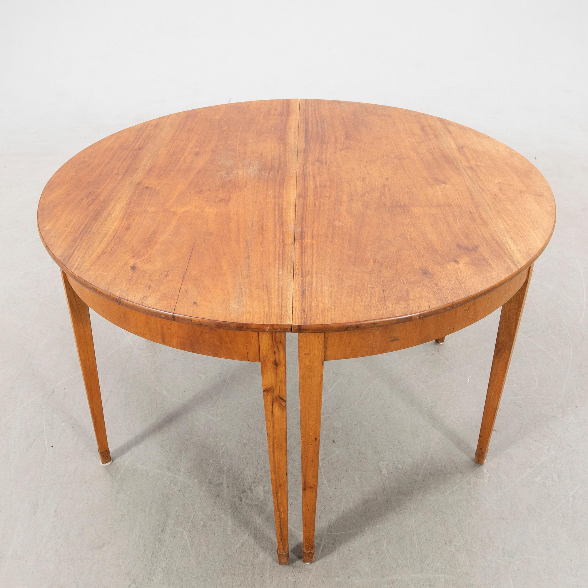 Dining table, turn of the 20th century.