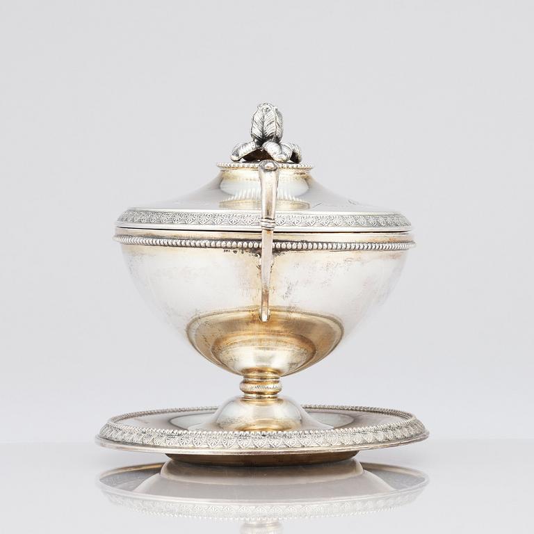 A Swedish early 20th Century silver bowl with lid, on a plate, Karl Anderson, Stockholm 1911. Gift from Queen Sofia.