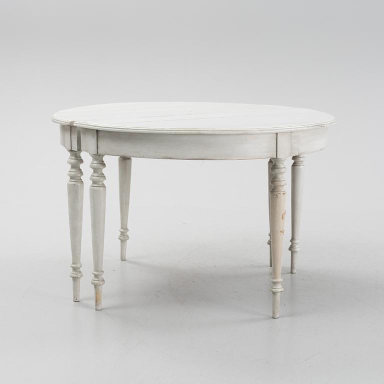 A painted dining table, 20th Century with older parts.