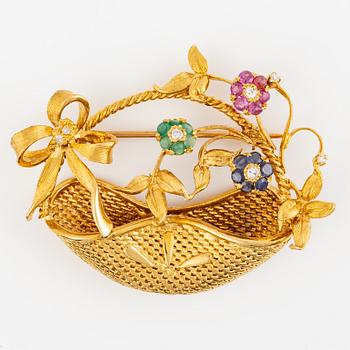 Brosch, i form av blomsterkorg, 18K guld med rubiner, kalcedon, safirer och diamanter.
