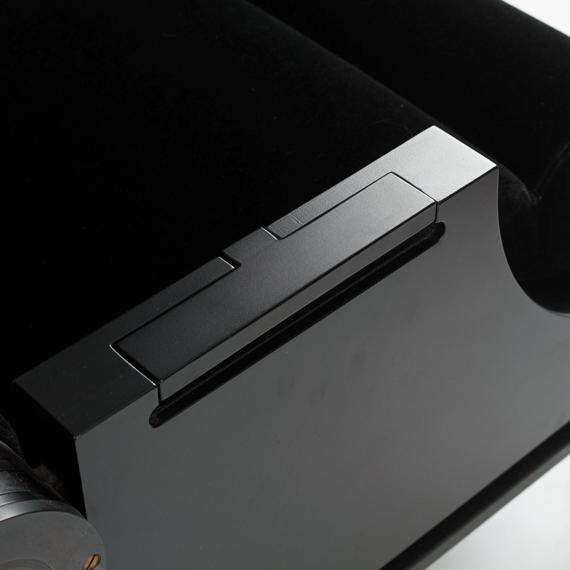 Alexander H Damsbo & Henrik Ingemann Nielsen, a "HC-Andersen Chair" armchair/table, ed. 3/49, Källemo, post 2005.