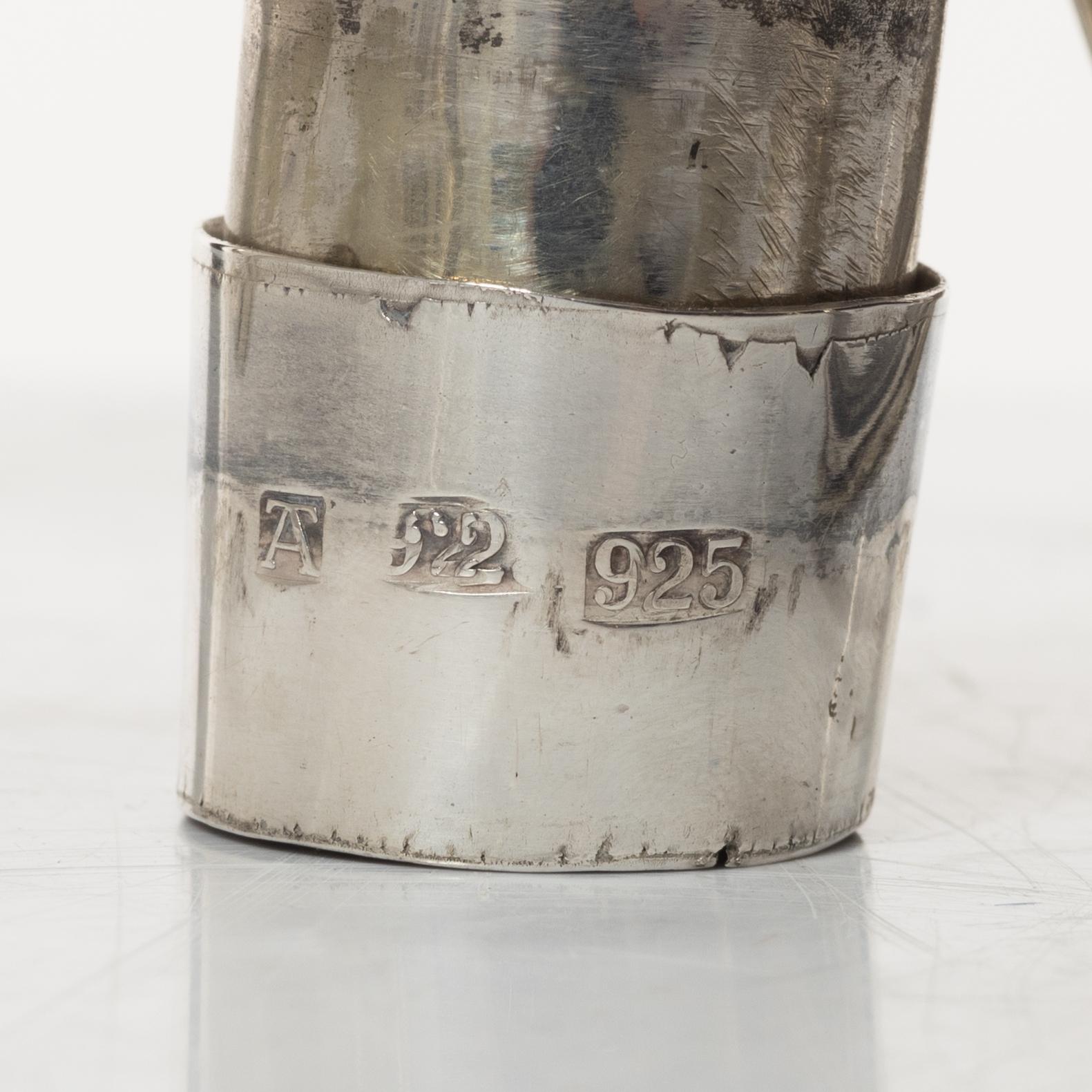 A pair of English silver candelabra, mark of Hawksworth, Eyre & Co Ltd, Sheffield 1892.